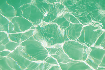Water abstract for background, Green swimming pool rippled.