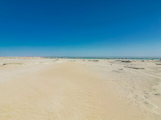 Camping tents surrounded by the desert in Yadan geological park, Qinghai, China, aerial