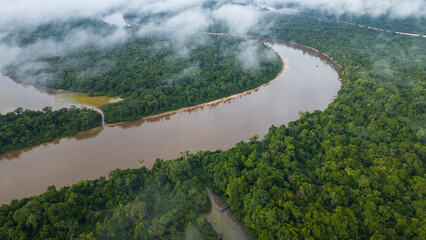 NANAY RIVER IN THE PERUVIAN JUNGLE, A LARGE AND COLORFUL BLACK WATER RIVER IN THE DEPTHS OF THE...