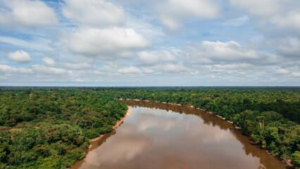 NANAY RIVER IN THE PERUVIAN JUNGLE, A LARGE AND COLORFUL BLACK WATER RIVER IN THE DEPTHS OF THE JUNGLE, A RIVER SURROUNDED BY TREES