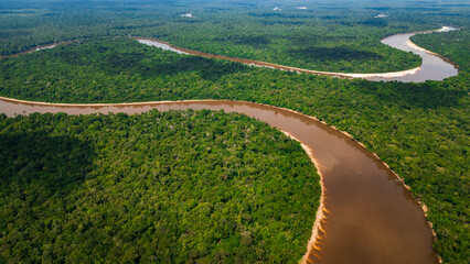 NANAY RIVER IN THE PERUVIAN JUNGLE, A LARGE AND COLORFUL BLACK WATER RIVER IN THE DEPTHS OF THE...