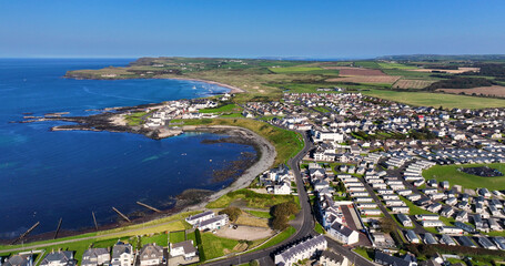 Aerial view of the beautiful Portballintrae Bay on the Co Antrim coast by the Atlantic Ocean Northern Ireland