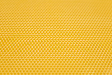 Natural organic beeswax blank background with selective focus