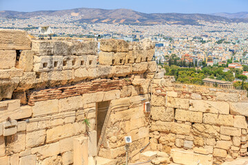 Obraz premium A stone building with a window and a microphone on top, Acropolis in Athens