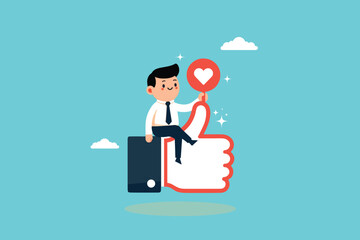 A sitting businessman gives a thumbs up while holding a love sign