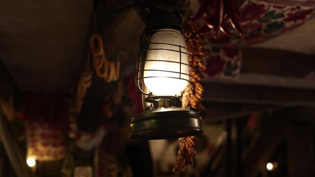 antique lantern in an old wooden Slavic house