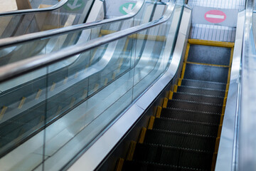 Obraz premium Modern Escalator in Urban Setting