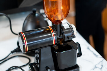 Modern Black Coffee Grinder with Orange Hopper