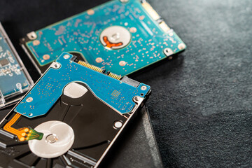 Close-Up of Hard Disk Drives on Dark Surface