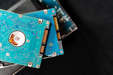 Close-up of Stacked Hard Drives with Circuit Boards