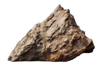 Large angular rock with textured surface set against a plain background in indoor lighting