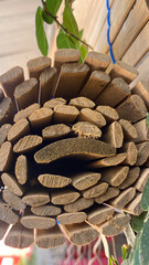 Woven bamboo is called "kere" in Indonesia, being rolled up to divide a room or block sunlight or rain outdoors.
