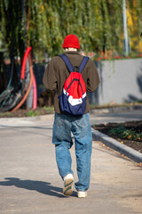 A man wearing a red hat