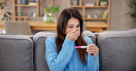 Pregnancy, test and happy woman on sofa for fertility treatment, ivf success and family planning....