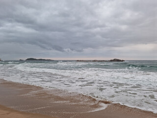 
It is Sampo Beach under a cloudy sky.