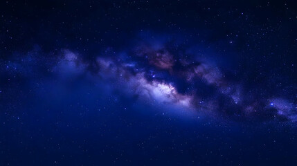 Fototapeta premium A Stunning View of the Milky Way Galaxy, with a Deep Blue Night Sky and Sparkling Stars