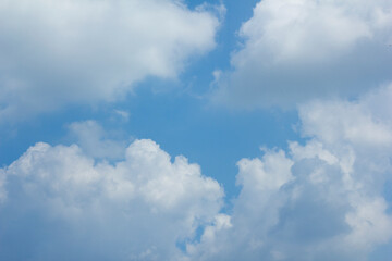 
Blue sky and white puffy clouds