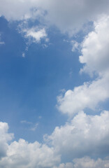 
Blue sky and white puffy clouds