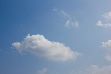 
Blue sky and white puffy clouds
