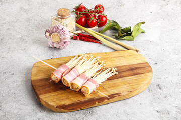 Raw Enoki mushroom with bacon