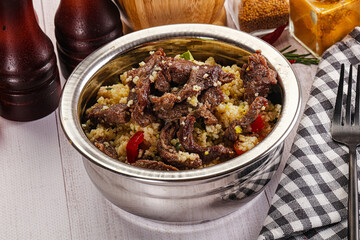 Traditional couscous with beef and vegetables