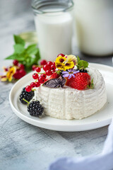 soft cheese with fresh berries