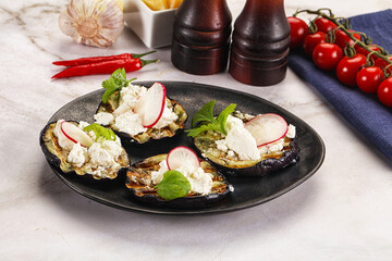 Grilled eggplant with cheese and radish
