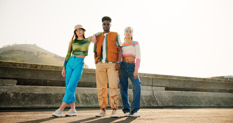 City, style and group of people with portrait, diversity and cool streetwear on bridge at sunset. Confidence, support and gen z friends with urban fashion, culture and bonding in street together.