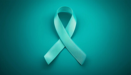 Teal ribbon symbolizing ovarian and cervical cancer awareness on a teal background. 