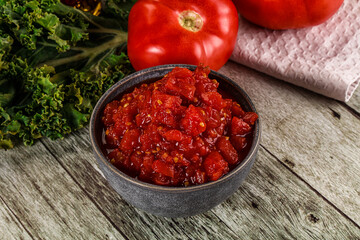 Diced ripe tomato with sauce