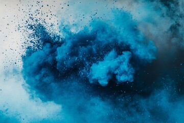 Obraz premium A stunning blue explosion of powder creating a dramatic cloud in the air. This artwork captures a unique blend of colors and textures.