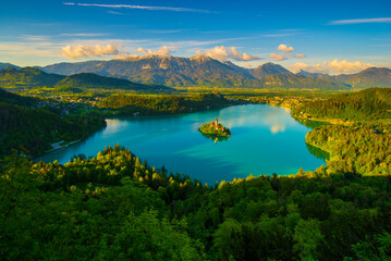 A beautiful aerial view of Lake Bled in Slovenia during sunset in the warm sunshine