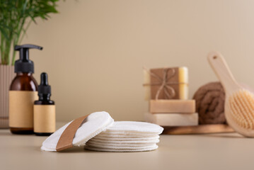Natural skincare products featuring reusable cotton pads, eco-friendly packaging, and spa essentials