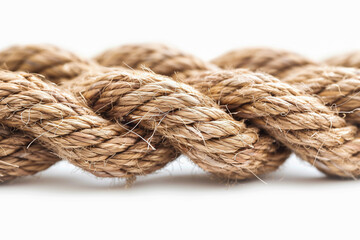 Closeup a large rope made up of many smaller ropes braided together, isolated on white background