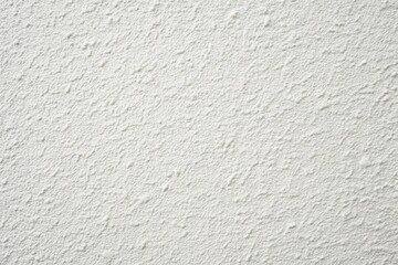 Fototapeta premium Close-up shot of a white textured wall background