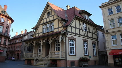 A large house with a porch and a balcony
