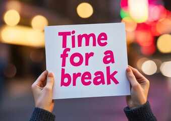 Hands Holding White Card With "Time For A Break"