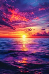 Fototapeta premium A beautiful sunset over the ocean with a purple and blue sky