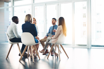 Meeting, team building and workshop with business people in office for support, training or equality. Collaboration, networking and development with employees in circle for communication and mission