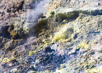 Volcanic landscape, yellow sulphur crystallised from vapour, fumes, rocks, apocolypse. Aeolian...