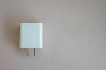 white battery charger adapter