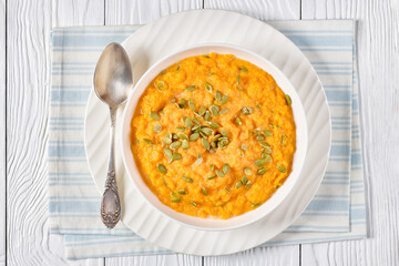 butternut squash puree with pumpkin seeds in bowl