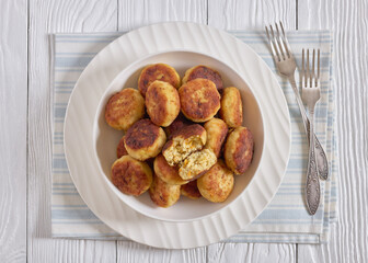 Northern Pike fish cakes in a white bowl