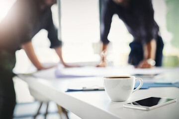Coffee, desk and meeting with business people in boardroom of office for planning together. Caffeine, collaboration and cup in company workplace with employee team in conversation for brainstorming