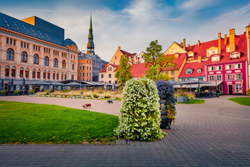Stunning summer cityscape of Riga. Picturesque evening view of popular tourist attraction -  Livu...