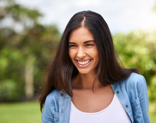 Face, smile and wellness with woman in garden outdoor to relax in summer for peace or wellness. Idea, thinking and vision with happy person in green nature park for holiday, travel or vacation