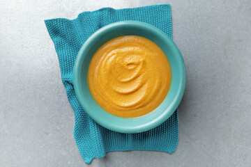 Pumpkin mashed soup cream in bowl