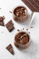 Tasty chocolate homemade creamy dessert in glasses 