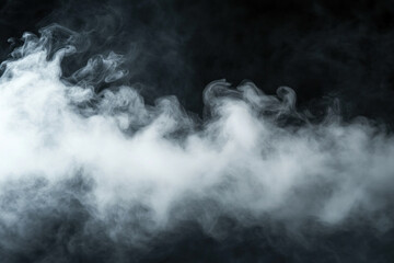 Fototapeta premium Dramatic swirls of white smoke against a black backdrop.
