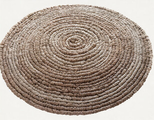 Natural woven round rug in neutral tones displayed on light background